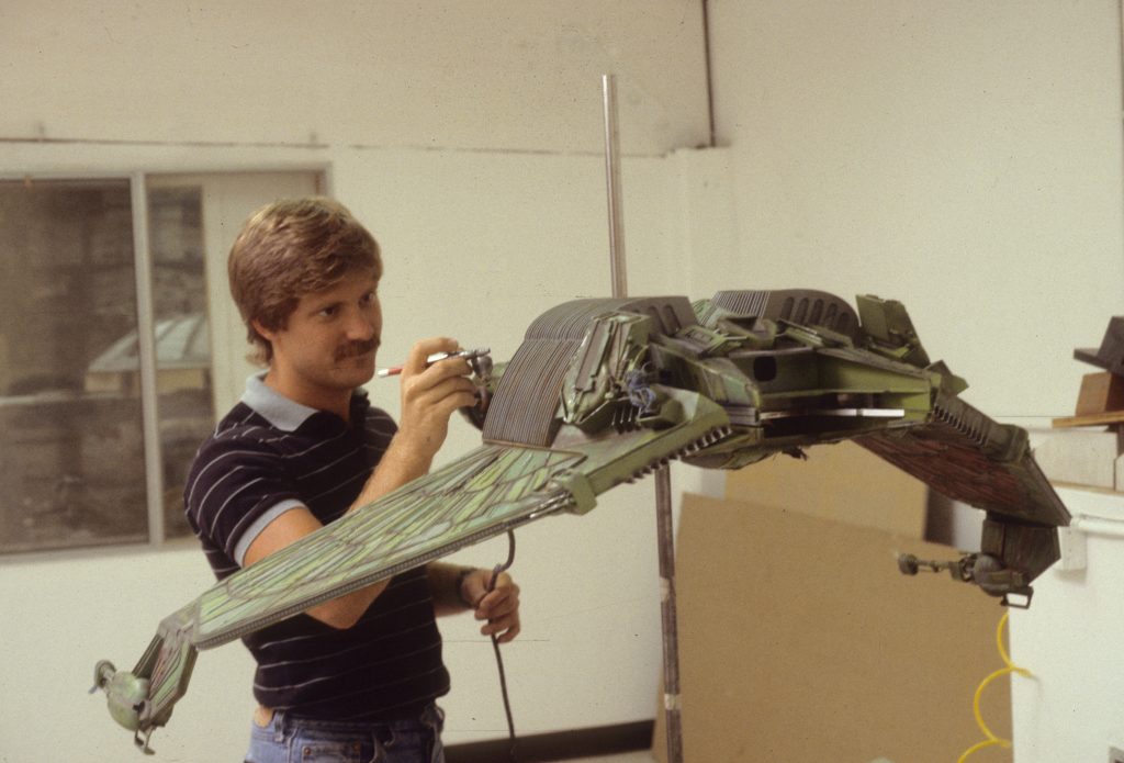 Modelmaker Bill George at work on the Bird-of-Prey miniature.